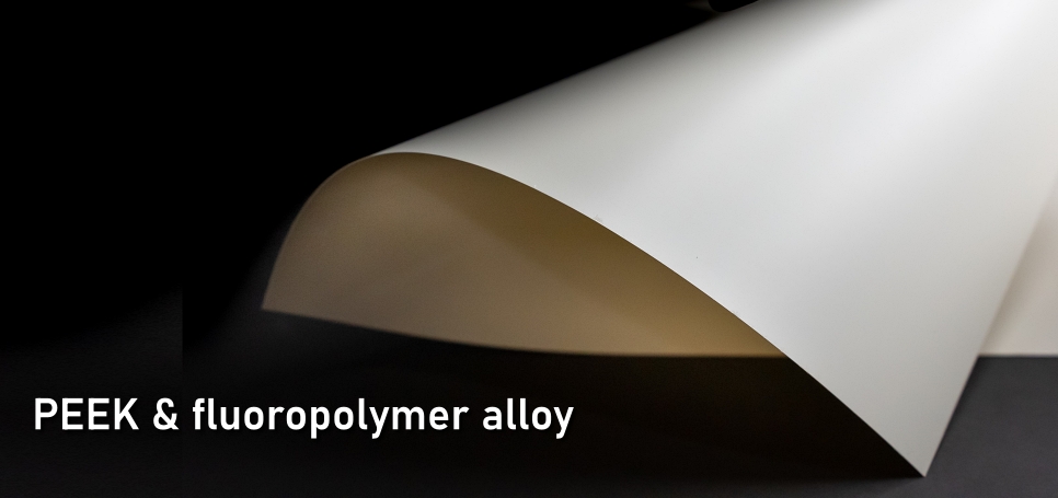 PEEK-fluoropolymer alloy